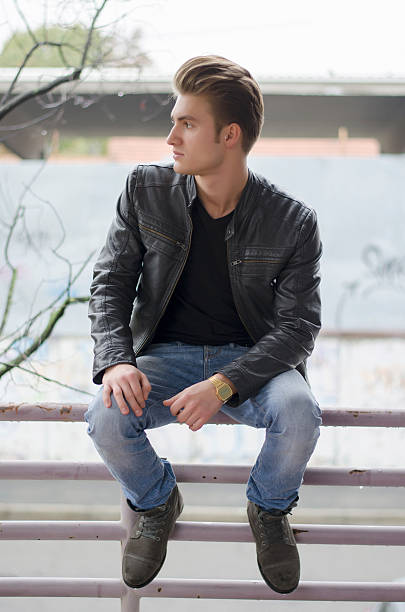 istock Attractive blond young man in city environment 474451106