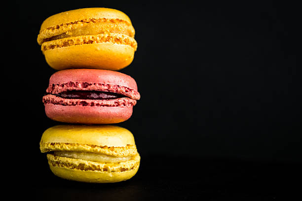 Colourful Stack Of Macaroons Isolated On Plain Black Background Stock Photo  - Download Image Now - iStock