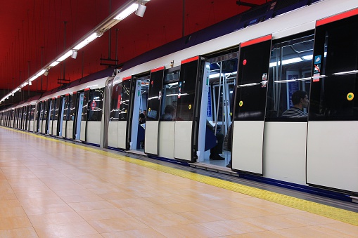 Madrid, Spain - October 23, 2012: People ride Madrid Metro train. Madrid Metro has annual ridership of 634 million passengers (2011).