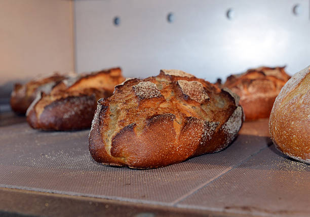 istock loaf of bread in the oven 474455109