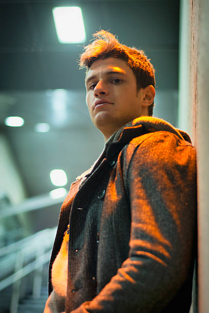 istock Profile shot of handsome young man inside train station 474457236