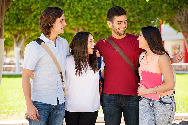 istock Friends having fun in college 474458984