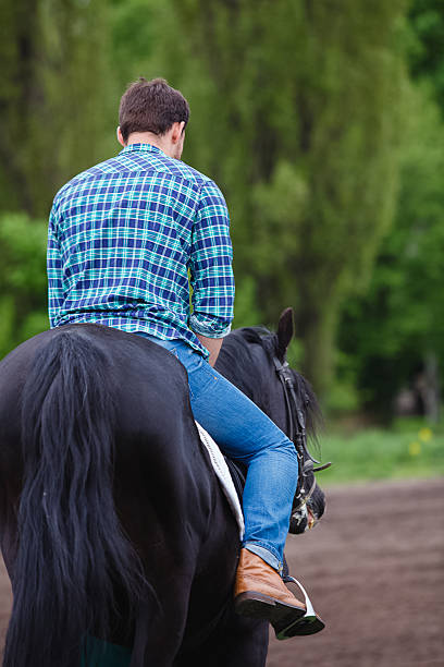 istock man riding a horse 474461210