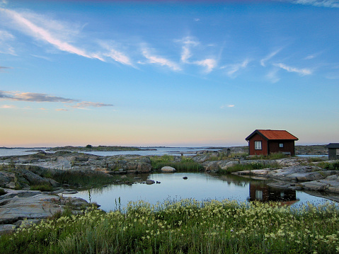 A small fishing village on the coast of Bohuslän in the Tjurpannan nature reserve near Grebbestad.