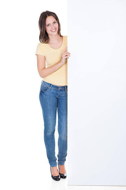 istock Happy Woman Holding Placard 474461740