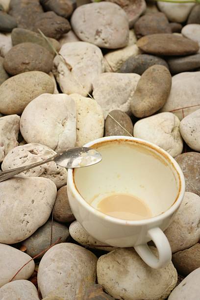 istock coffee cup wih tea spoon on stone background. 474464724