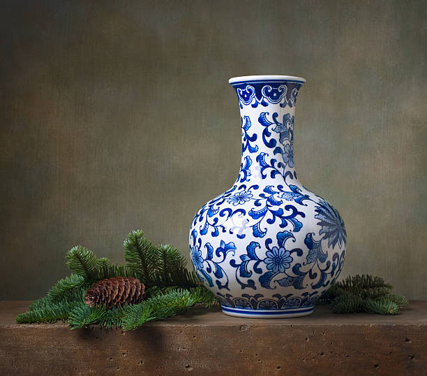 Still life with chinese vase and fir branches