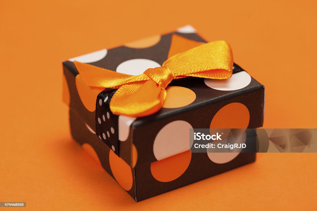 Arancio presente - Foto stock royalty-free di Arancione