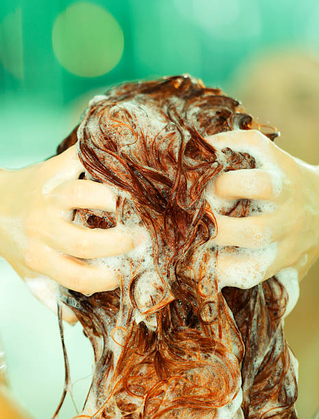 istock washing red hair 474468569