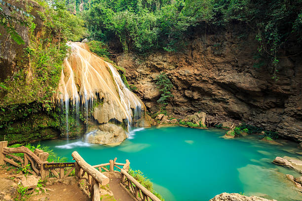 istock wonderful waterfall with colorful tree in thailand 474468628