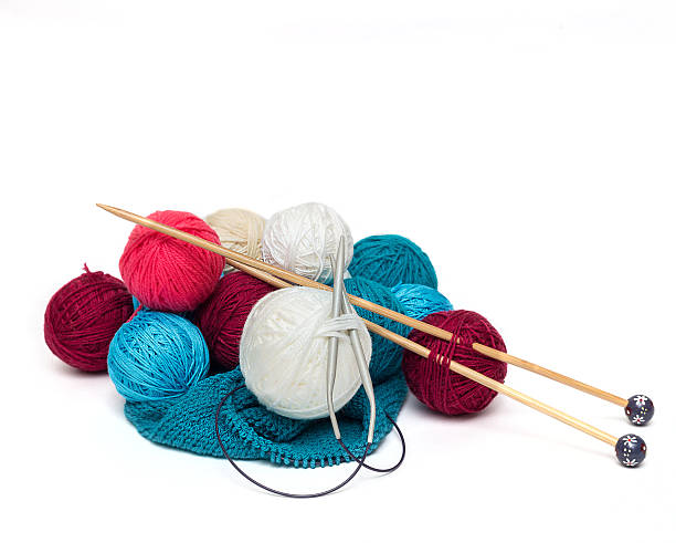 istock colorful balls of wool with needles 474470482