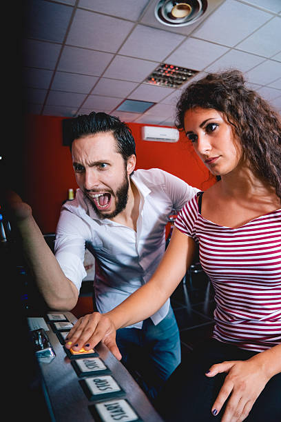 istock Friends Playing The Slots, Desperate Faces 474472670