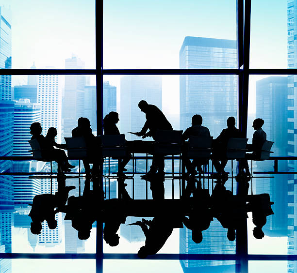 istock Business People Talking in a Board Room 474475596