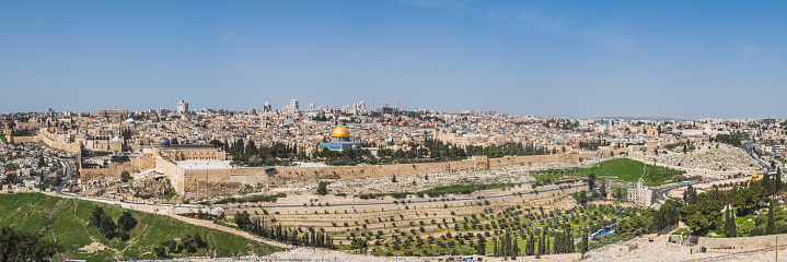 Panorama of the Old City of Jerusalem, Israel, taken from the Mount of Olives, on a beautiful sunny day, including the dome of the rock & the western wall.