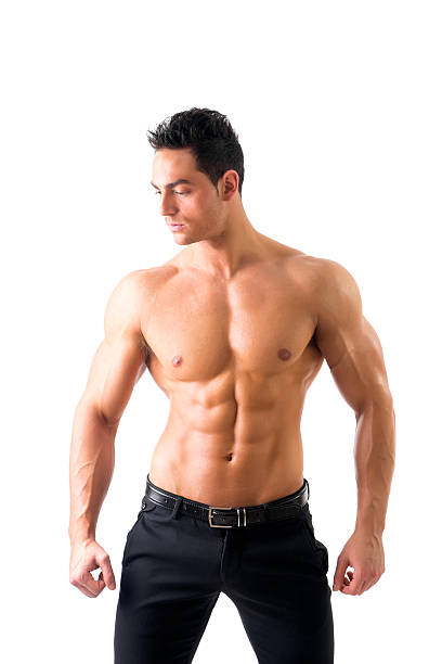istock Handsome topless muscular man standing, isolated 474475806