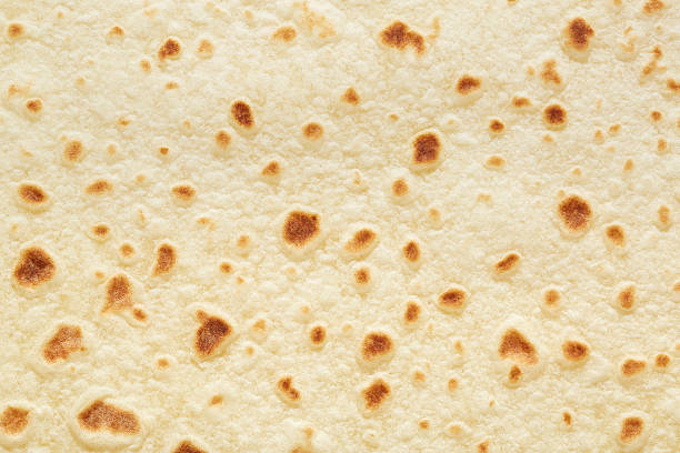 istock Piadina, italian tortilla background 474476422