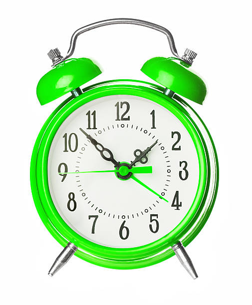 istock Green Old Style Alarm Clock Isolated On White 474479360