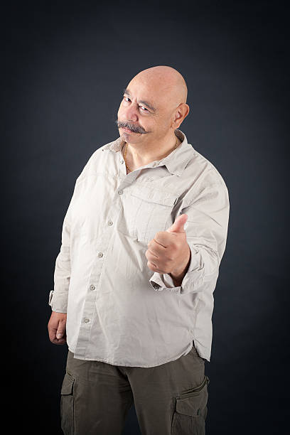 istock Handsome man doing different expressions in different sets of clothes 474480398