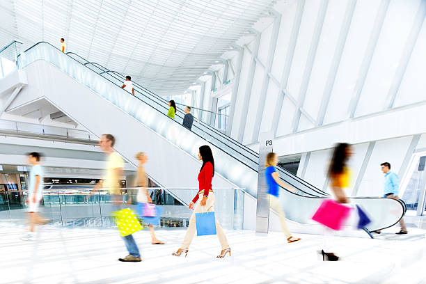 istock Motion Blurred People in the Shopping Mall 474486163