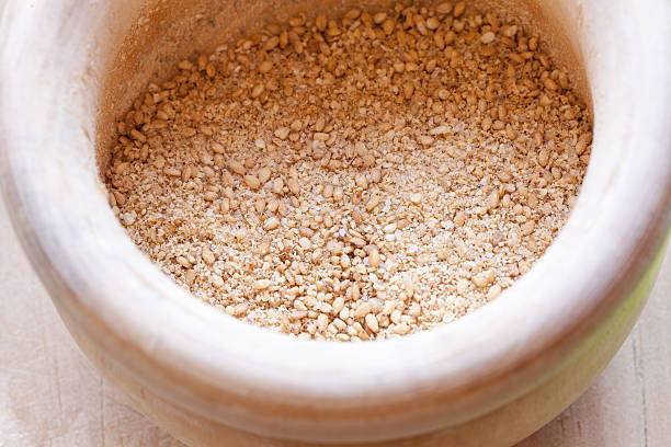 istock Close-up view of organic Gomasio in a ceramic bowl 474486536