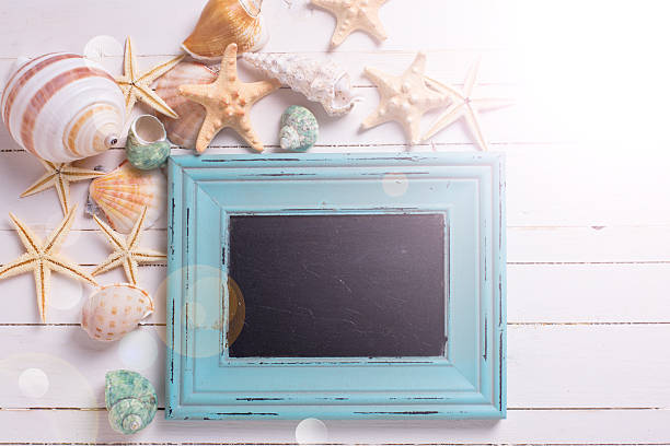 istock Empty blackboard and marine items on wooden background. 474489568