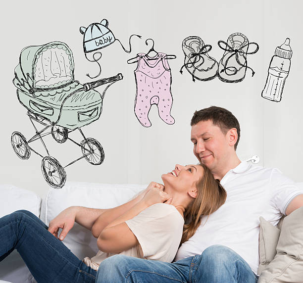 coppia adulta pianificazione baby - protection finance family wealth foto e immagini stock
