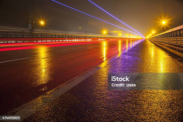Reflector Lights And Road Surface At Rainy Night Stock Photo - Download Image Now - Road Reflector, Dark, Country Road