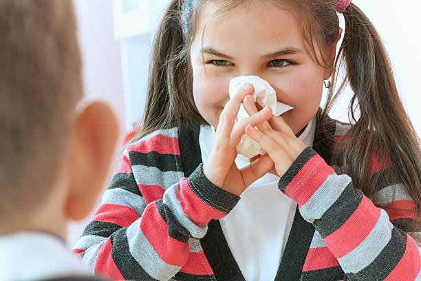 istock Sick little girl with a cold 474493067