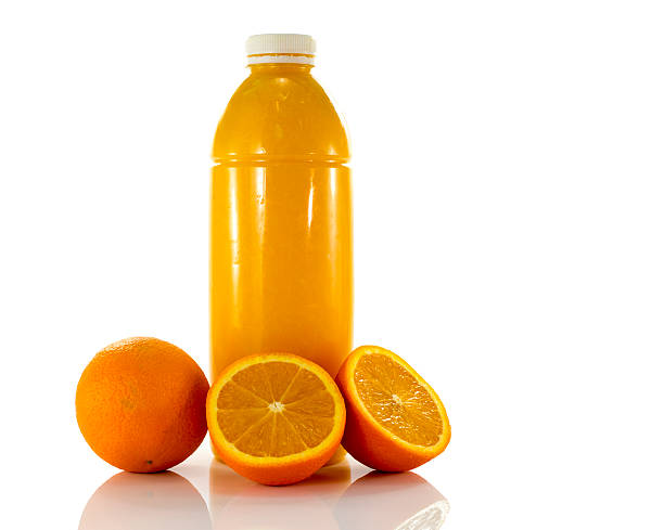 istock bottle with fresh orange juice 474494993
