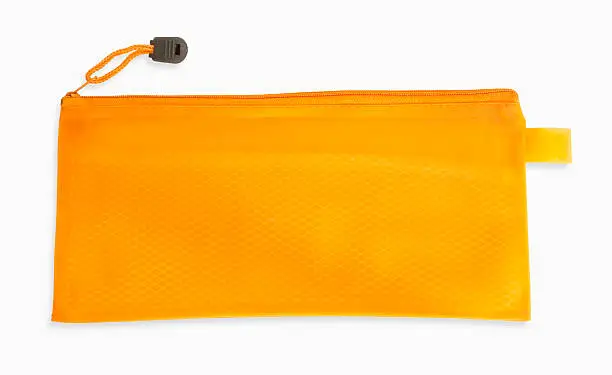 Photo of orange pencil case isolated on white background