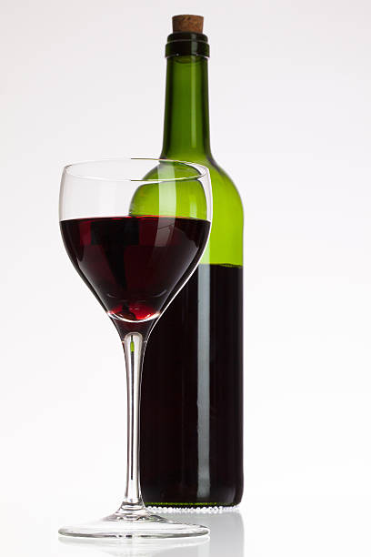 istock Glass and bottle with red wine 474496250