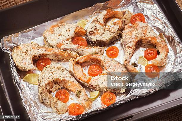 Trout With Vegetables Cooked In The Oven Stock Photo - Download Image Now - Baked, Baked Salmon, Citrus Fruit