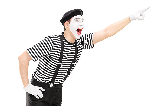 istock Mime artist pointing up with his hand 474496882
