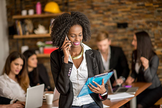 istock African woman talking on the phone 474497844