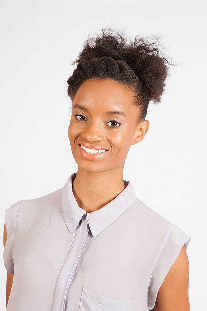 istock Black woman smiling at the camera 474498144
