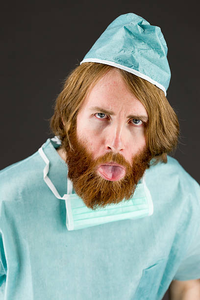 istock model isolated on plain background face sticking tongue out 474499296