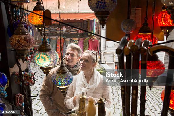 Travellers Shop For Handicrafts In Bazaar Stock Photo - Download Image Now - 2015, Activity, Adult