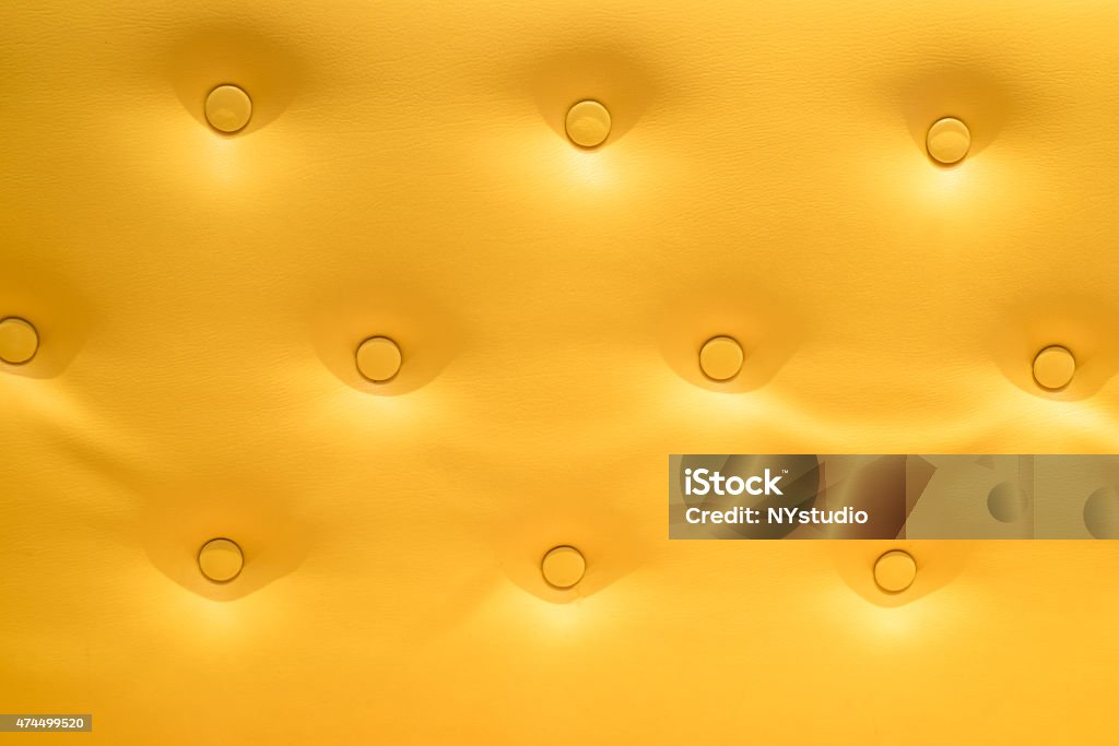 Closeup of golden sofa for background 2015 Stock Photo