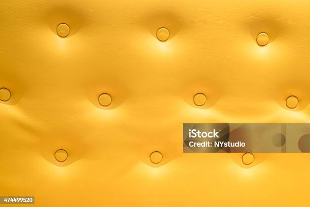 Closeup Of Golden Sofa For Background Stock Photo - Download Image Now - 2015, Abstract, Armchair