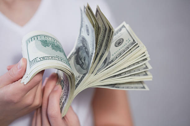 istock Money in female hands 474500166