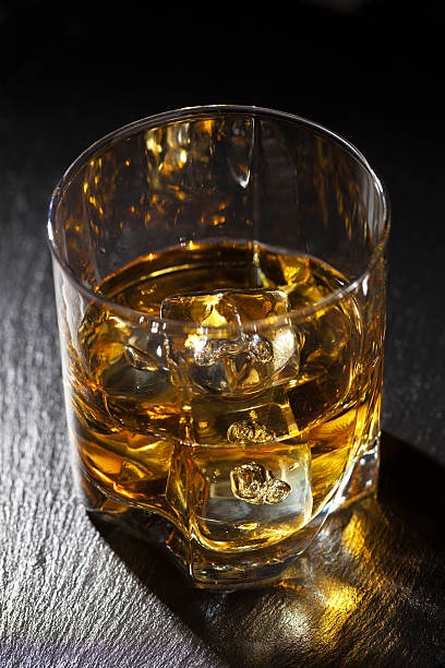istock Glass of whiskey with ice 474502066