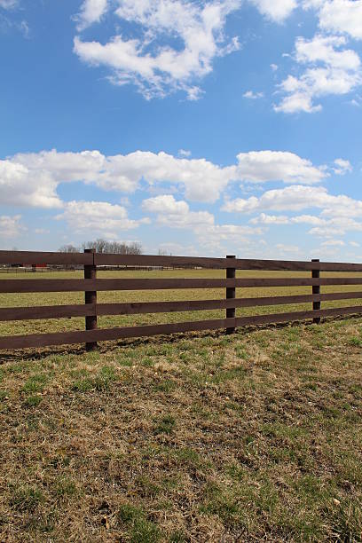 istock Farm fence and afternoon sky 474502124