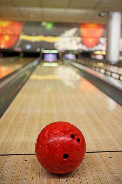 istock Red Bowling Ball on a Bowling Alley 474504394