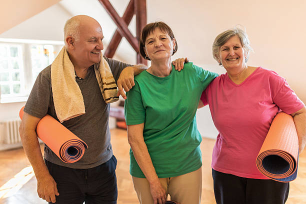 istock Happy senior friends ready for an exercise class. 474504410