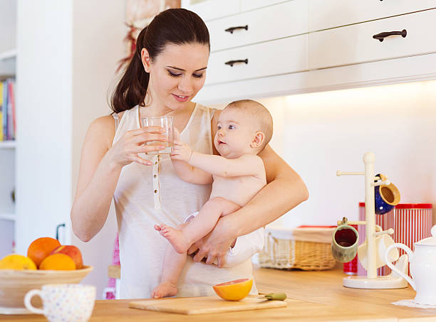 istock Little baby girl with her mother 474504792