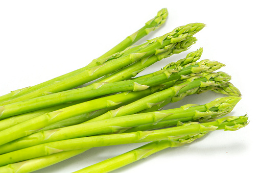 green asparagus isolated on white background