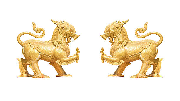 istock Two gold Lion statue Isolated on white background 474506434