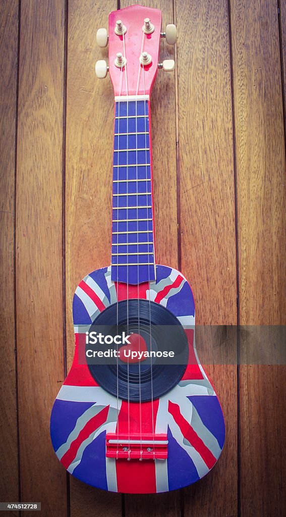 Ukulele Love A ukulele decorated with a union jack with a vinyl record and a red love heart UK Stock Photo