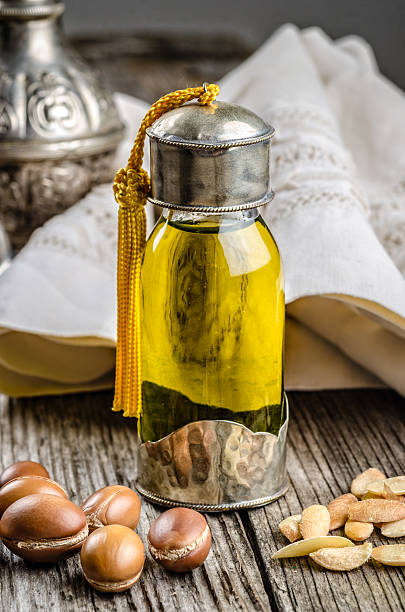 Argan oil with fruits stock photo