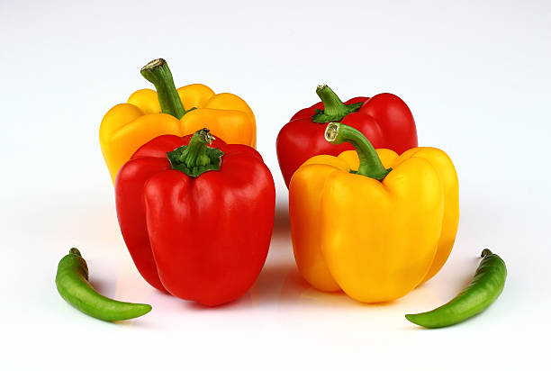 istock Red and yellow capsicum, bell peppers 474516362